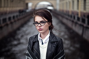 woman in black leather jacket