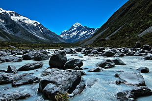 rock field, mountains HD wallpaper