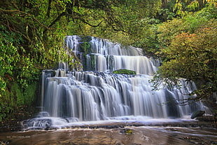 time lapse photo of waterfall during daytime