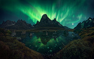 Northern Lights over mountains HD wallpaper